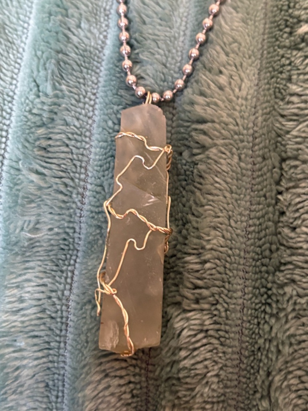Wire wrapped crystal